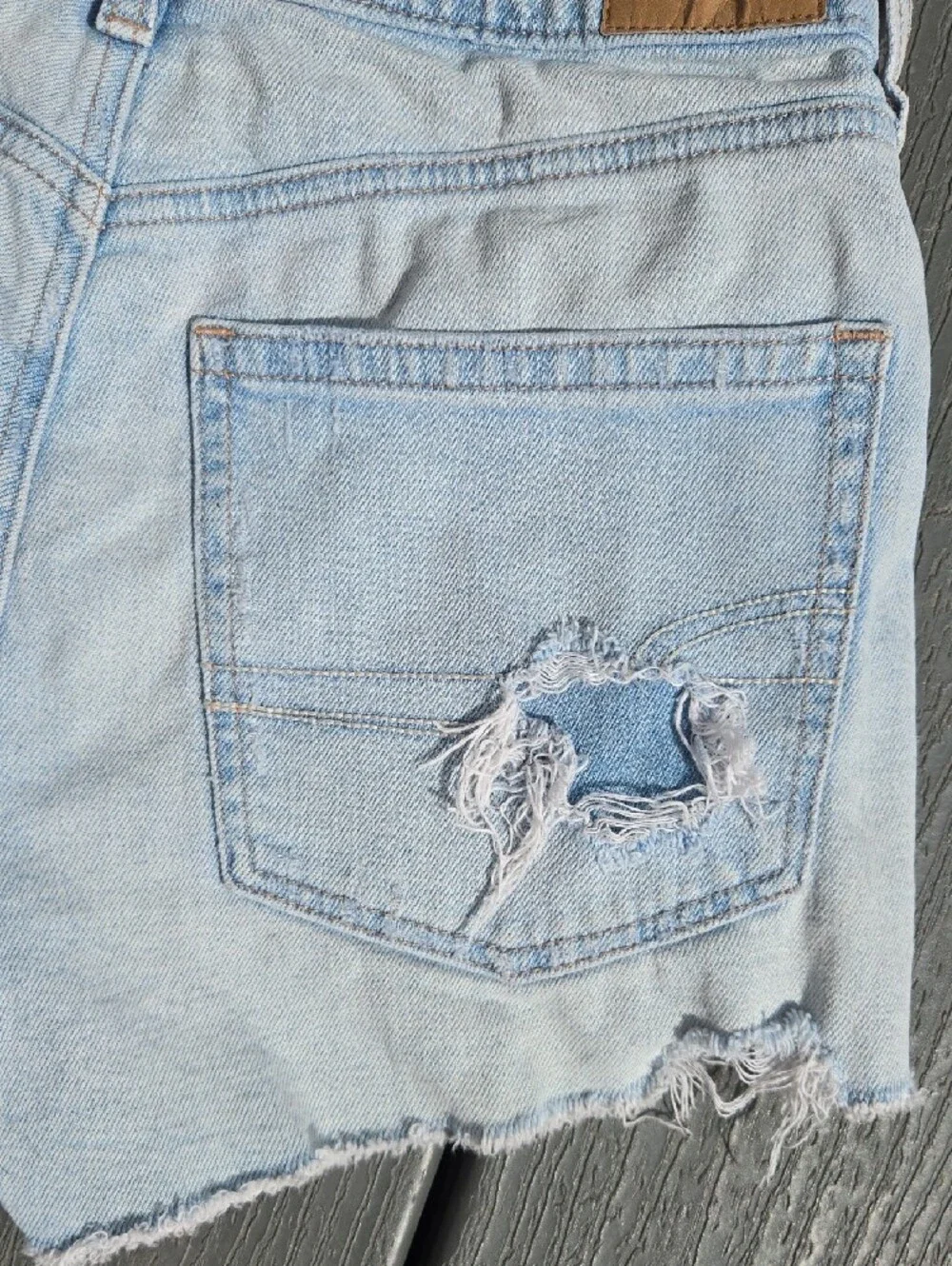 American Eagle Outfitters Strigid Light Wash Distressed Denim Shorts